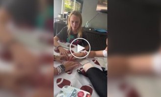 Teenagers try to get a disc out of its case