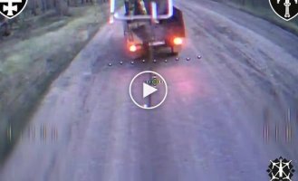 A kamikaze drone attacked a rare enemy UAZ Cargo truck with a Russian in the back