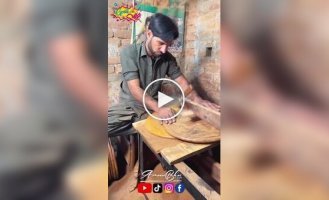 A craftsman from Pakistan handcrafted an unusual folding fruit table