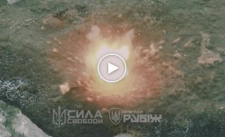 A Russian infantryman shoots down our kamikaze drone with a backpack, causing a detonation