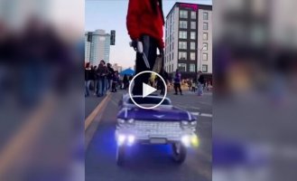 A guy built an electric skateboard in the shape of a car