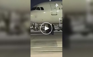 Passengers ran onto the runway, trying to catch the plane.