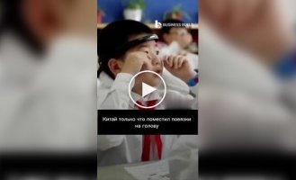 Chinese schoolchildren were forced to wear armbands that track which of the children is slacking off