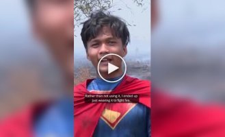 A teenager dressed as a superhero puts out fires in Indonesia