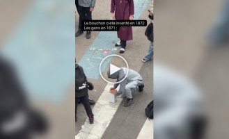 Protester steals a gas can but can't open it