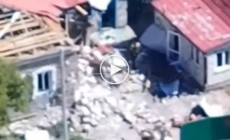 The occupier flies high above the houses after the attack of the Ukrainian drone