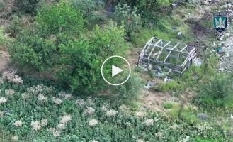 The body of a Russian soldier was engulfed in flames after an attack by a Ukrainian strike drone drone