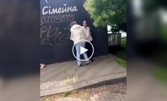 A Passerby Stands Up for a Man on the Street Who Was a Victim of His Wife's Abuse