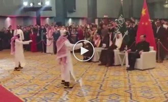 Chinese robots perform a traditional Saudi Arabian dance
