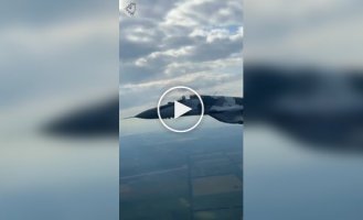 A Ukrainian MiG-29 pilot performs a barrel roll aerobatics while returning from a combat mission