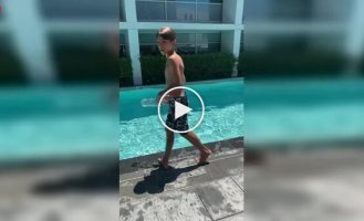 When you're filming your child by the pool and accidentally catch a bonus