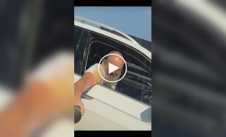 A driver tried to pour coffee on his opponent, but was injured himself