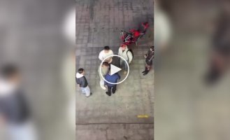 In China, Men Use Spit-In-The-Face Instead of Fighting