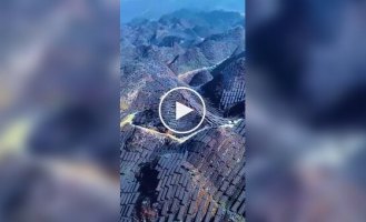 Mountains in China completely covered in solar panels were filmed from above