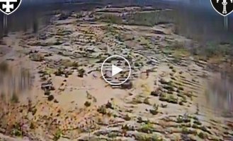 A kamikaze drone operator hits an occupier who crawled out of cover