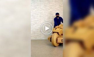 A guy made a cardboard transforming motorcycle