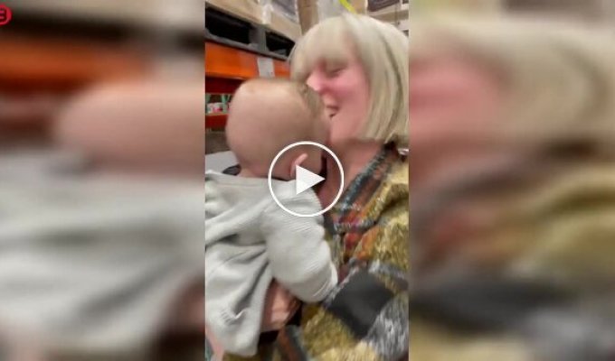 A child fell into a mountain of pillows in a store
