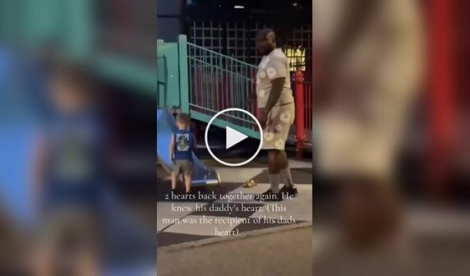 A touching scene: a boy plays with a man who received his father's heart transplant