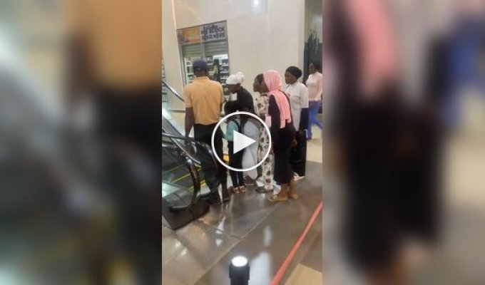A woman's painful encounter with an escalator