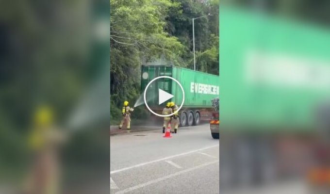 A truck carrying batteries caught fire in Hong Kong and exploded