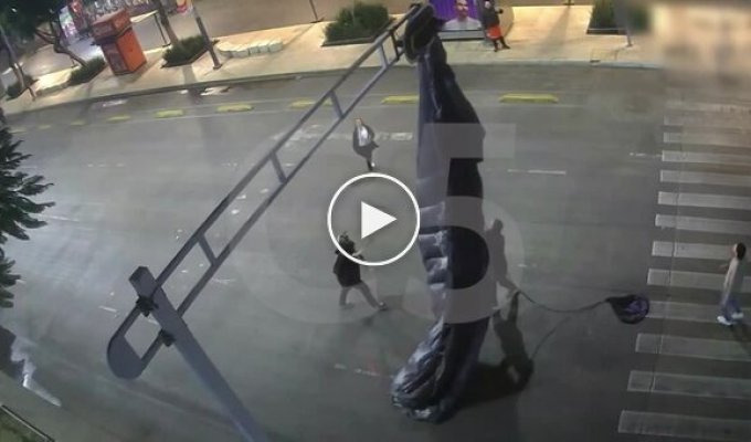 In Mexico City, a parachutist was rescued from a city traffic light