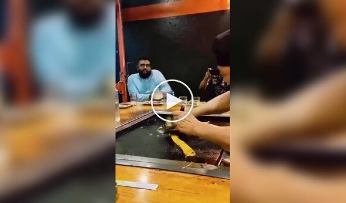 Chefs entertain customers