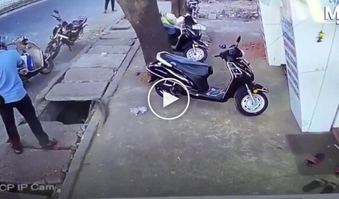 A man fell into a hole after stepping on the edge of a tile