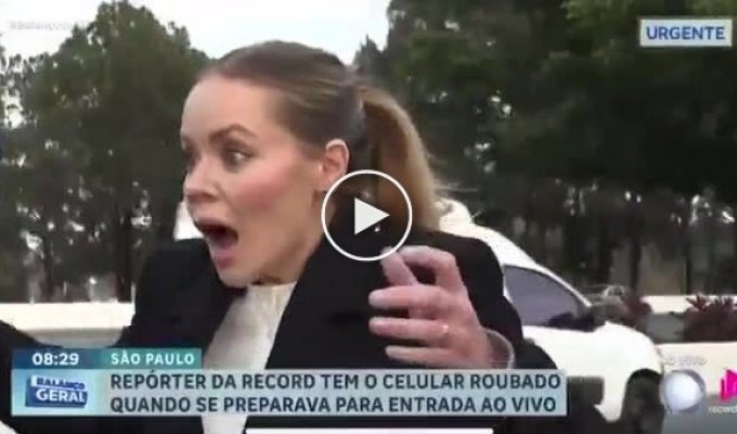 Brazil: thief on bicycle steals reporter's phone live on air