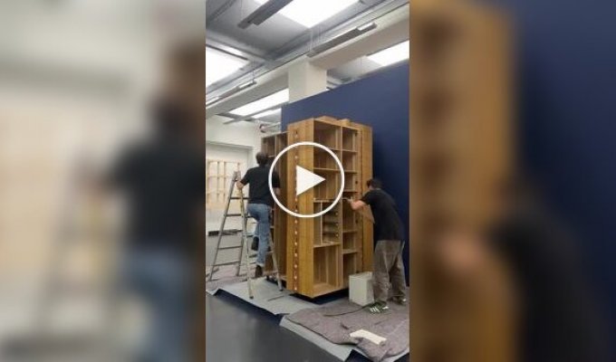 A cabinet in the shape of a multi-story building.