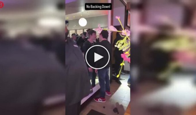 A drunk guy started a showdown... with his reflection in the mirror