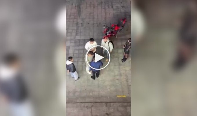 In China, Men Use Spit-In-The-Face Instead of Fighting