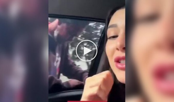 A girl filmed a man trying to break into her car on live TV.