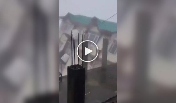 A five-story residential building collapses in India as a result of a landslide