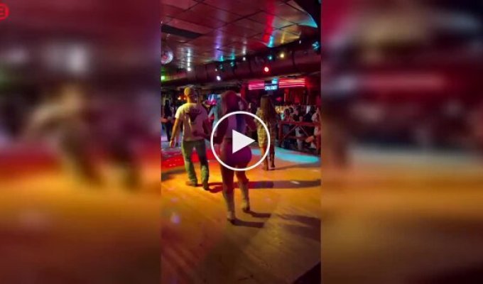 Line dancing to country music.