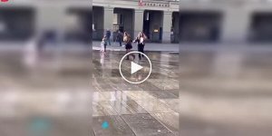 A Bern fountain jokes with passersby: a stream of water hit right under a skirt