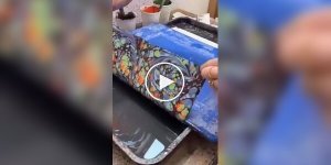 A girl showed the process of restoring an ancient book.